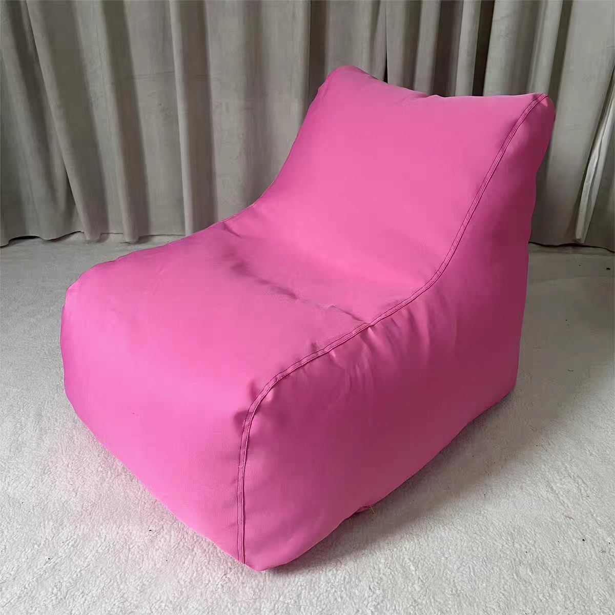 Orange bean bag chair usage scene